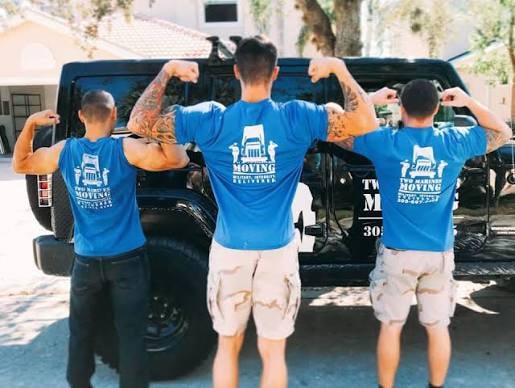 Two Marines Moving professionals at work