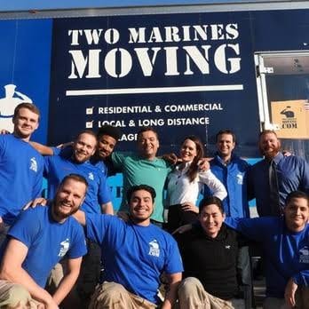 Two Marines Moving team on the job