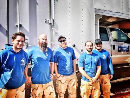 Two Marines Moving crew at work